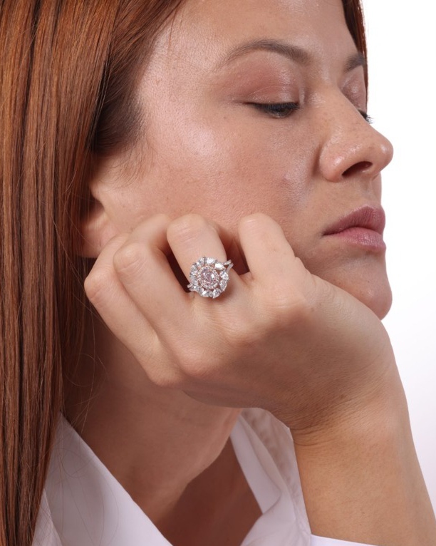Model wearing a statement diamond flower ring